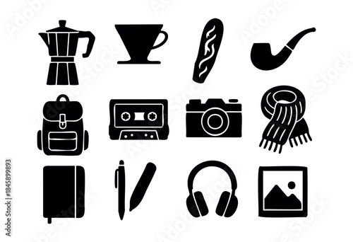 A collection of twelve black silhouette icons representing various creative, cozy, and vintage lifestyle essentials like coffee brewing equipment, a camera, a cassette, and travel gear — stock vector.