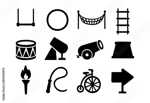 A collection of black silhouette vector icons representing various elements of a circus performance, including trapeze, cannon, drum, and spotlight. — stock vector.