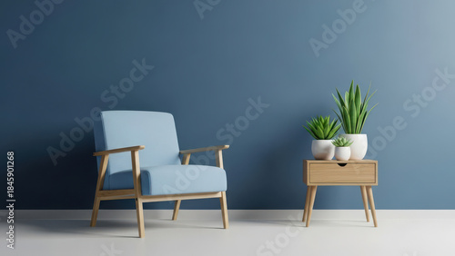 Minimalist living room corner with blue armchair and plant