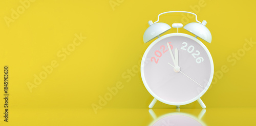 Vinatge Alarm clock turning 2025 into 2026 shows the New Year countdown of time transition, future planning, celebration and year end change while 2025 fading away