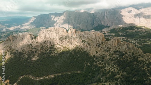 Stunning aerial landscape of Puig Campana mountain in Costa Blanca, Spain, ideal for hiking, nature, travel, and adventure backgrounds or tourism promotion.
