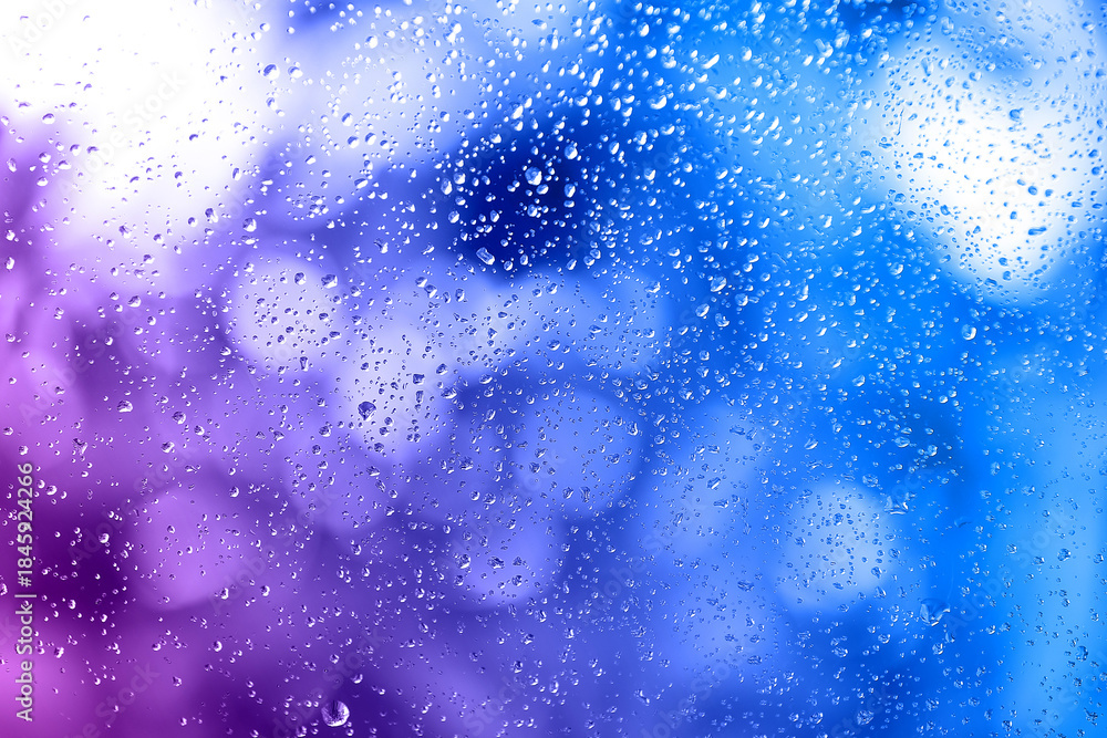 Fototapeta premium Glass window surface with water drops, closeup view