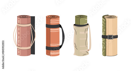 Four rolled up yoga mats with straps and bags, isolated on white background