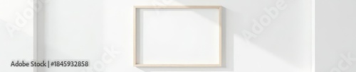 Hanging empty white photo frame, simple white wall , hanging, art