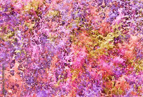 splashing water in various colors creates an energetic warm colored, vivid backdrop