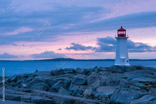 Wallpaper Mural Famous Peggy's Point Lighthouse in dramatic sunset light, Nova Scotia, Canada Torontodigital.ca