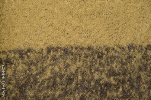 Close-up,High resolution of yellow and medium-brown knit or woven texture.