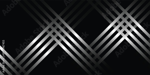 Abstract geometric pattern with intersecting silver lines on a dark background creating a modern design.