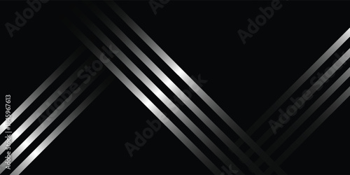 Abstract dark background with intersecting silver gradient lines creating a modern and dynamic geometric pattern.