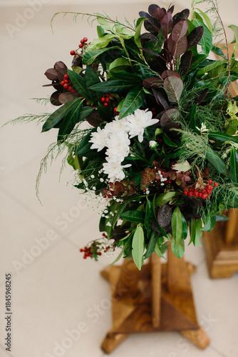Canvastavla Baptismal floral arrangement decorating church during ceremony