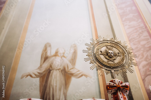 Ornate religious object with cherub face in church