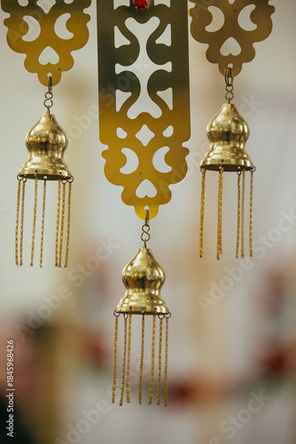 Golden church ornaments hanging symbolizing faith and tradition
