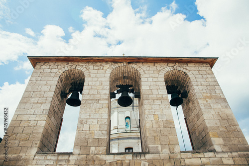 Church bell tower against blue sky