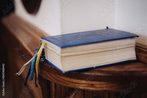 Religious book with cross symbolizing spiritual learning