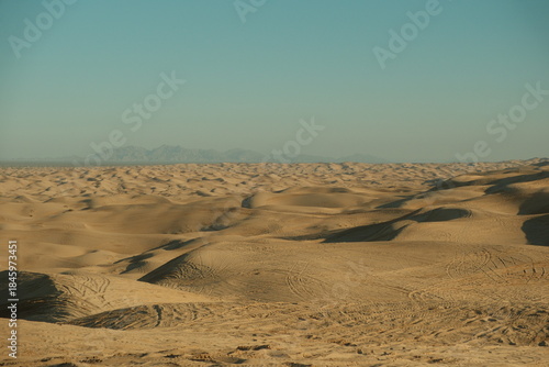 Empty Imperial sand dunes at Glamis california with OHV, dune buggies, ATV track marks