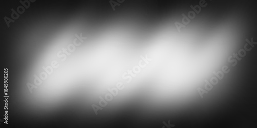 Subtle dark overlay texture designed for adding depth, contrast, and soft light glow effects to images. Ideal for blending modes in photo editing, background enhancement, cinematic lighting, vignette