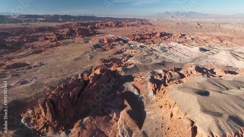 Aerial Panoramic View of Valley of Fire State Park in Nevada near Las Vegas with Stunning Natural Landscape and Rock Formations during Golden Hour Sunset - 4K Drone