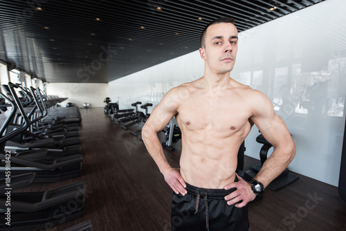 Man In Gym Showing His Well Trained Body