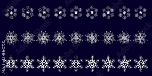 Delicate white floral patterns arranged in rows against a dark blue background