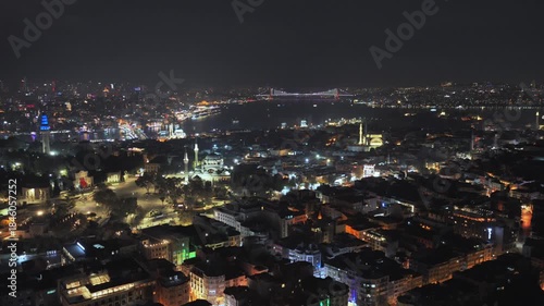 Wallpaper Mural The Blue Mosque Golden Horn synagogue temple night time skyline Istanbul Turkey Türkiye aerial drone cityscape Bosphorus Strait harbor view boat ferry bridge panoramic landscape buildings circle left Torontodigital.ca