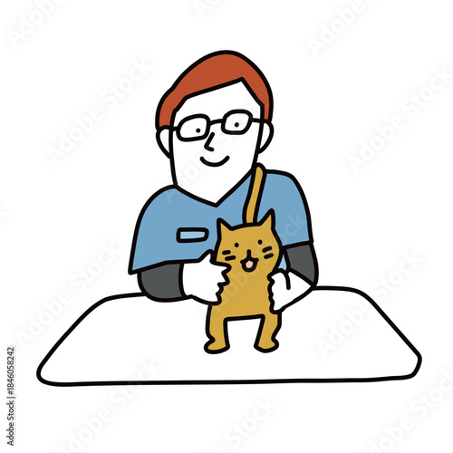 動物病院の診察室　患者の猫を診察する男性獣医師