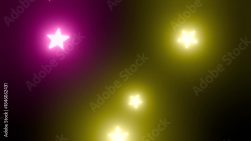 回転しながら落下するカラフルな星