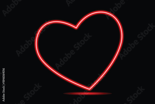 A vibrant red neon heart glowing brightly against a deep black background
