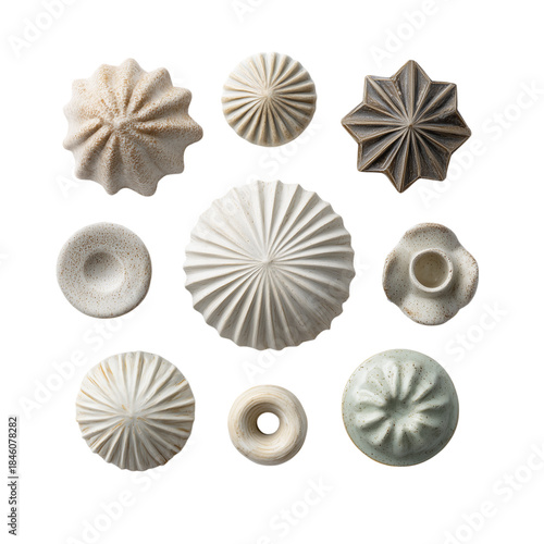 Collection of small sculptural ceramic pieces minimal layout Isolated on a transparent background