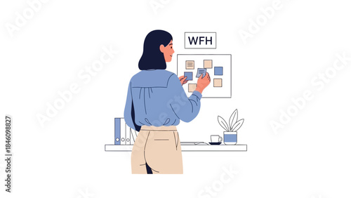 Woman working from home, planning tasks on a notice board with sticky notes in a clean office