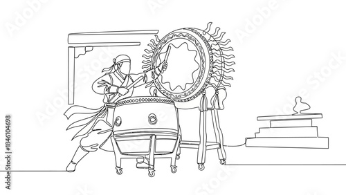 Traditional Japanese performer playing a taiko drum with a large decorative mirror or shield in