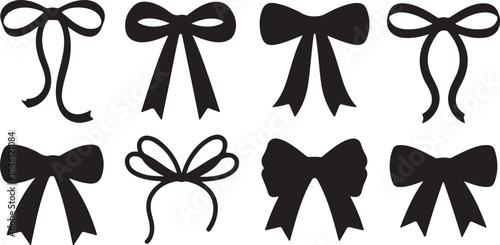 A collection of various black silhouette decorative gift bows and festive ribbons on a white backdrop