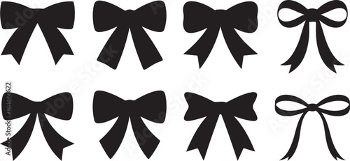 A neat arrangement of eight classic black ribbon bow silhouettes presented on a clean white field