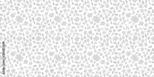 Abstract grey and white speckled pattern with a dense randomized texture