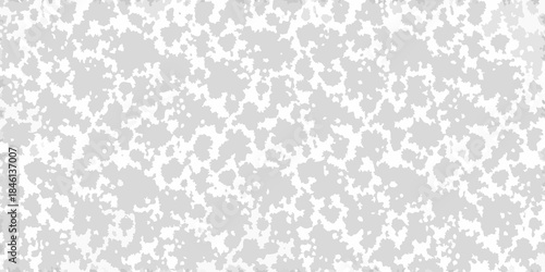 Abstract grayscale texture with a speckled random pattern and soft contrasts