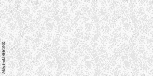 Abstract gray speckled background with a grainy textured appearance