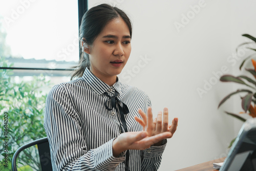Overjoyed businesswoman happy for successful work.