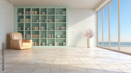 Cozy armchair faces large bookshelf and ocean view through window.