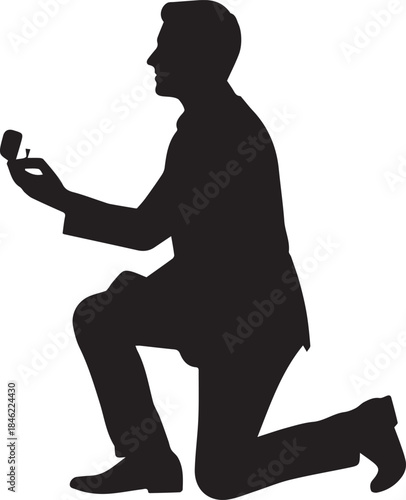 Silhouette of a man proposing with a ring on one knee