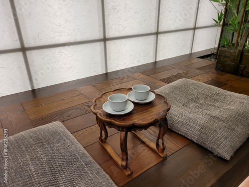 Traditional Korean Seating Area with Low Wooden Table and Tea Cups