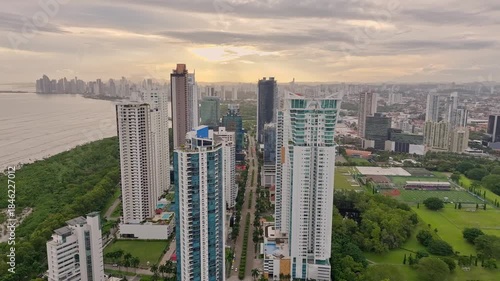 Wallpaper Mural Aerial drone shot moving through buildings in Panama Costa del Este with the sunset in the background Torontodigital.ca