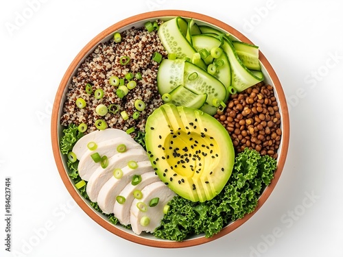 Healthy bowl with quinoa, chicken, avocado, and vegetables