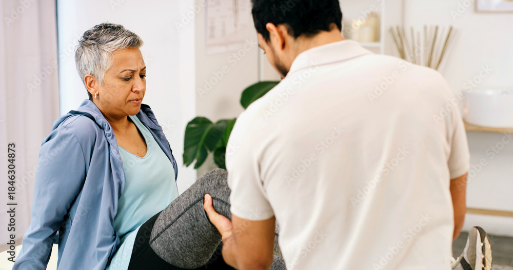 Obraz premium Physiotherapy, leg stretch or woman in clinic for consultation, aid or service in rehabilitation. Healthcare, mature client or chiropractor in center with checkup, injury or visit for muscle recovery