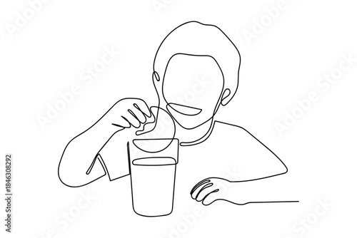 In a continuous line, a boy is dipping a cookie into a glass of milk for breakfast. Single line draw design vector graphic illustration Editable stroke.