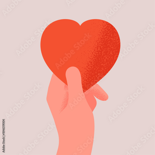 Hand holding a heart with grain texture