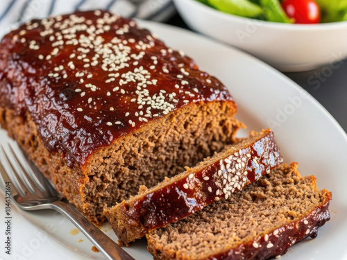Gingerbread loaf with sesame seeds isolated on white background