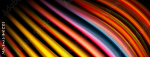 Colorful curved lines form abstract pattern. Bright hues blend, creating dynamic visual effect. Black background emphasizes vibrant shapes.