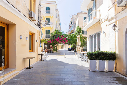 Fototapeta Naklejka Na Ścianę i Meble -  Historic alley in Corfu Town, Greece, with pastel facades