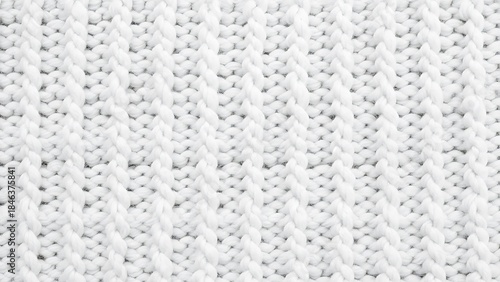 White knitted fabric with intricate texture and warm woolen pattern for cozy background