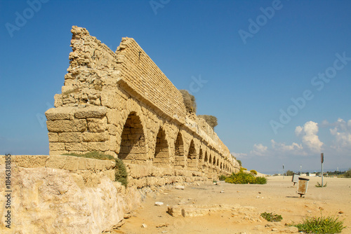 A section of the magnificent ancient Roman aquaduct, where it crosses the Mediterranean beach at Ceaserea Maritima in Israel