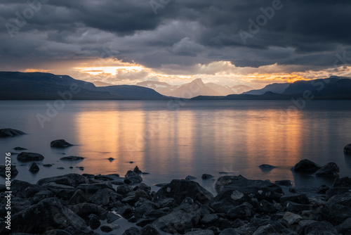 Dramatic sunset over Kilpisjärvi lake in Finnish Lapland